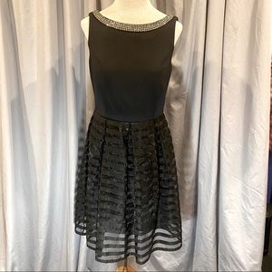 Cocktail dress 37.5” in length.  Waist 29.5”. Bottom is striped sheer.